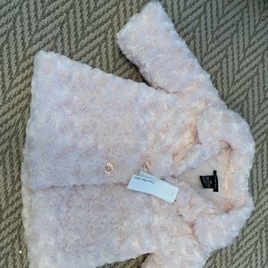 Calvin Klein rosette “fur” coat